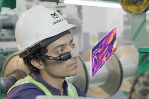 A manufacturing industry worker wearing Realwear Thermal Camera